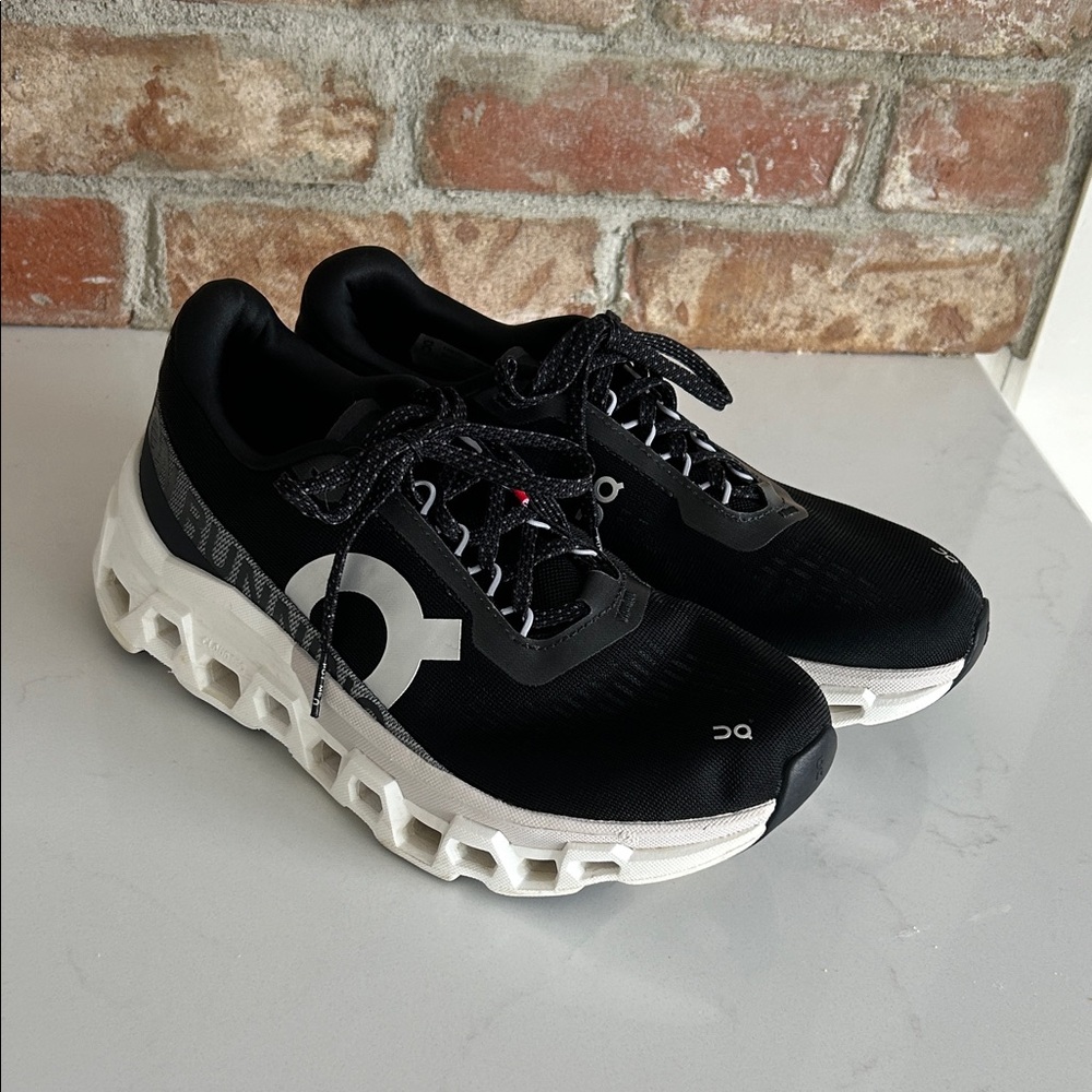 On Running Black and White Athletic Shoes
